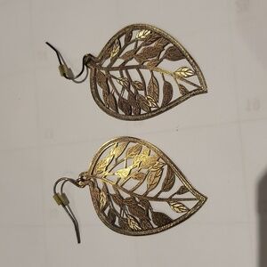 Shiny gold leaf shaped earrings